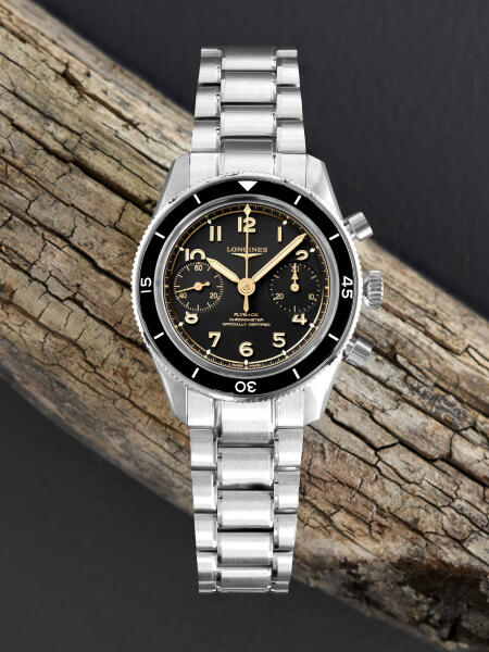A Hamilton watch with a wood and grey background.