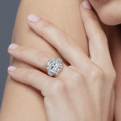 Diamond engagement ring worn on hand