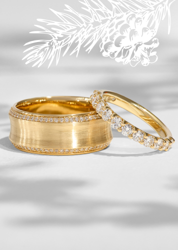 Oval diamond halo engagement ring set in yellow gold