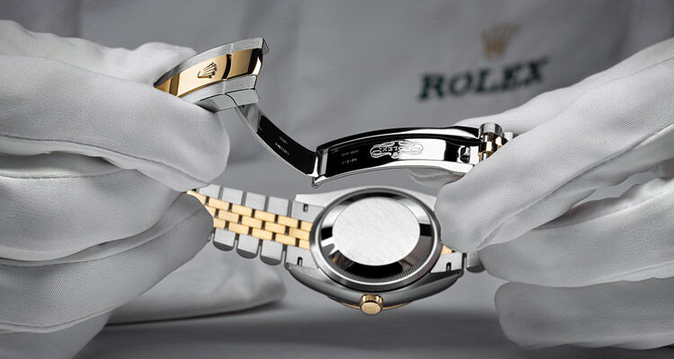 Back casing of a Rolex watch being inspected for service 