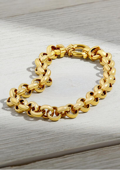 Bold yellow gold bracelet.