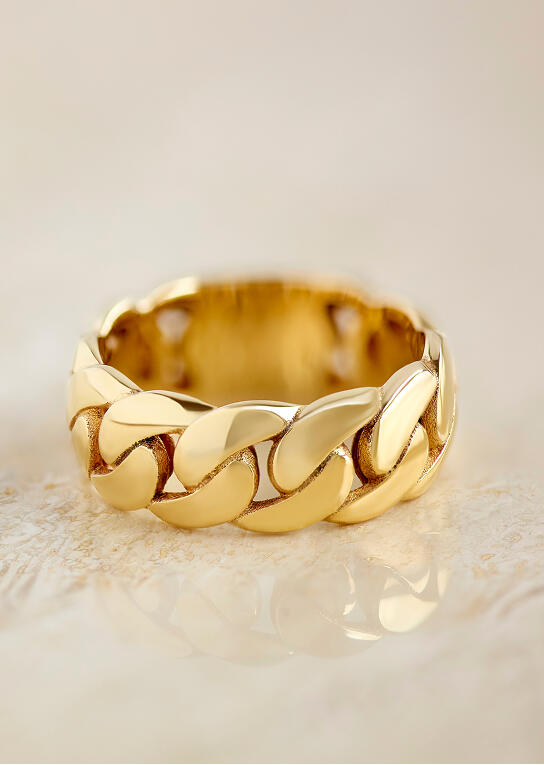 Bold yellow gold ring crafted from curb links