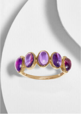 Yellow gold ring with purple gemstones