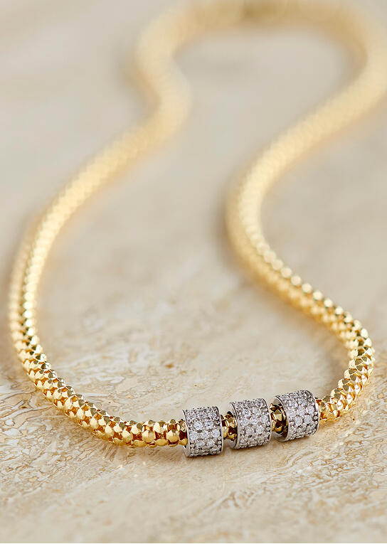 Yellow gold necklace with smooth popcorn links and white gold diamond stations
