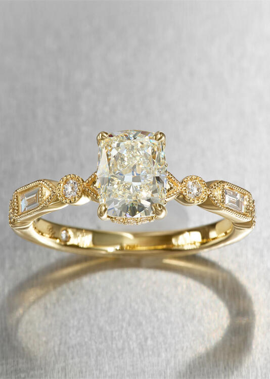 A timeless yellow gold and diamond engagement ring.