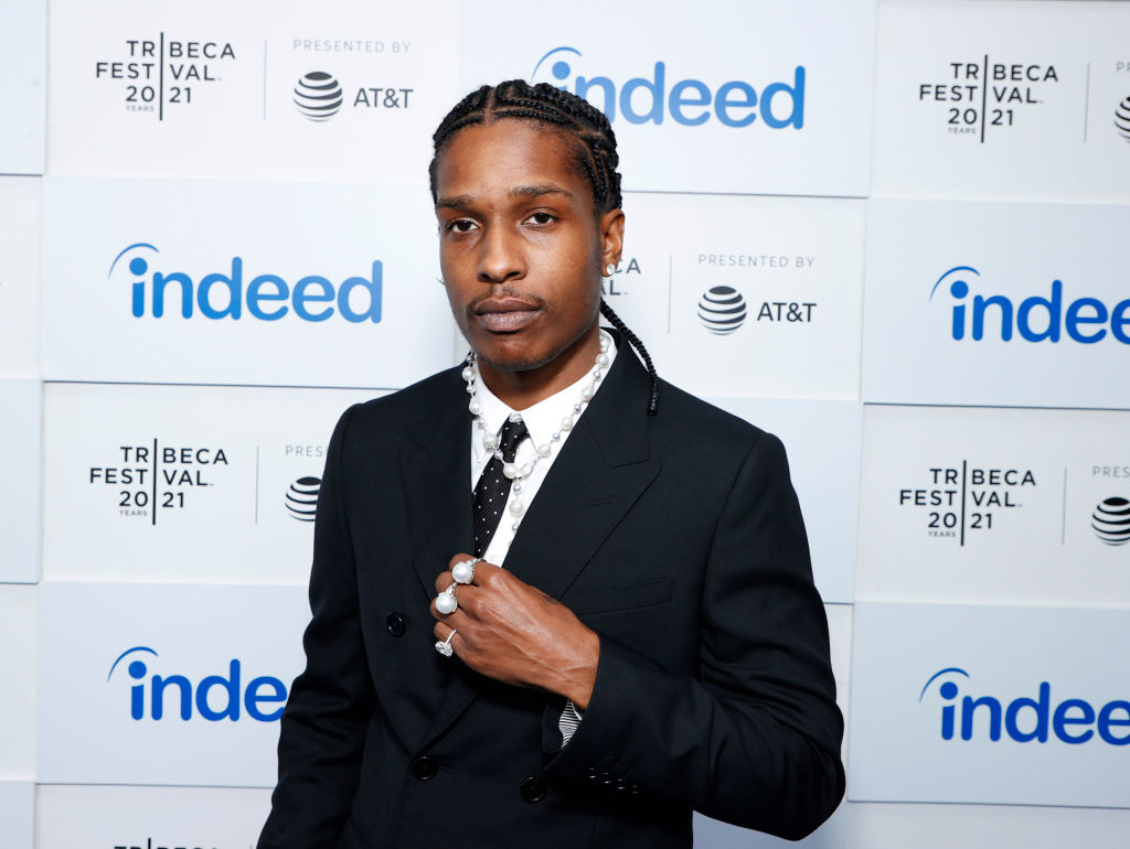 A$AP Rocky wearing a suit with pearl jewelry on the red carpet A$AP Rocky wearing a suit with pearl jewelry on the red carpet