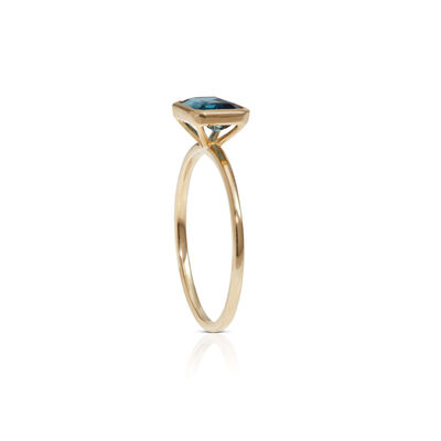 Bezel Set Emerald Cut Blue Topaz Ring 14K