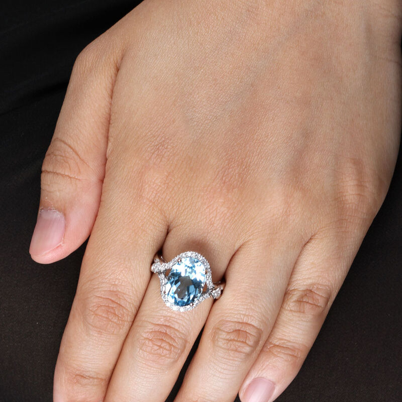 Sky Blue Topaz & Halo Diamond Ring 14K image number 1