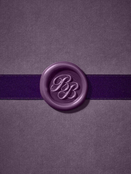 Purple wax seal with Ben Bridge logo over a darker purple ribbon.