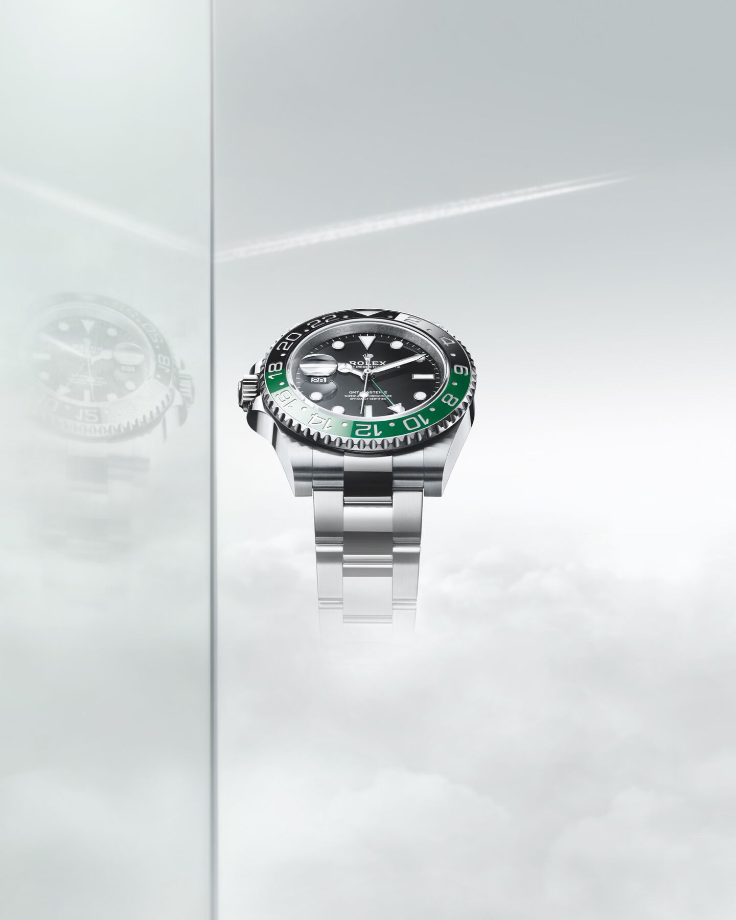 Rolex GMT Master with green and black bezel and green GMT hand. 