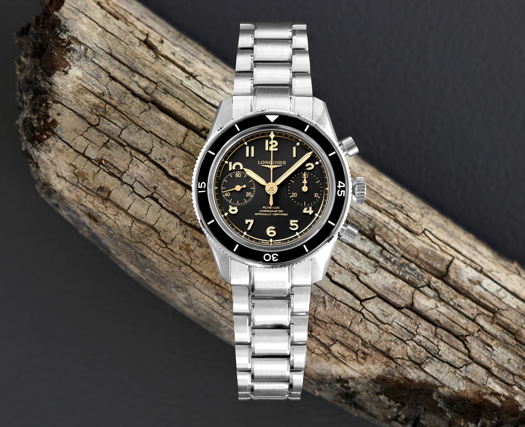 Longines sports watch with a black dial and stainless steel case and bracelet.