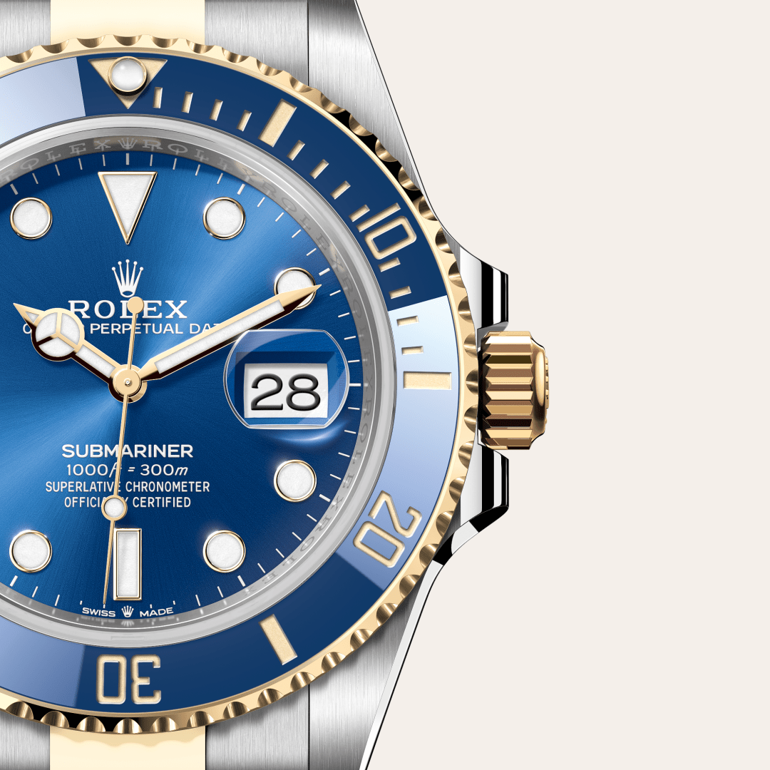 rolex submariner in yellow rolesor - combination of oystersteel and yellow gold, m126613lb-0002 - watch dial - ben bridge